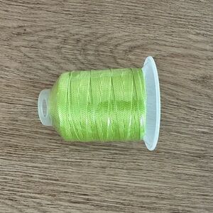 Vibrant Green Thread Spool for Crafting